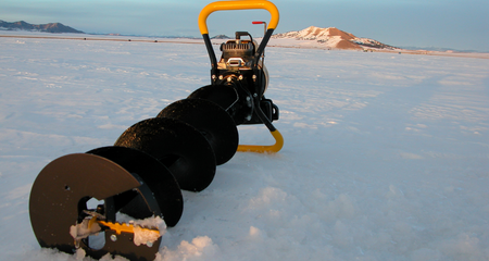 Photo of ice auger lying on ice