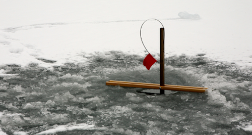 Photo of tip up for ice fishing