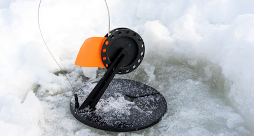 Photo of ice fishing tip up spool with line